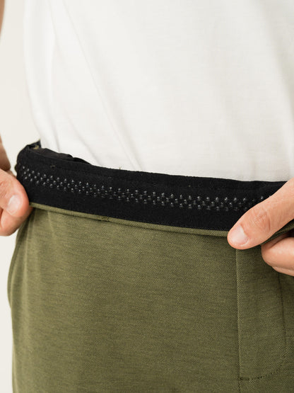 Stretch waistband close up of greek olive green slim fit power stretch pant at Pant Project