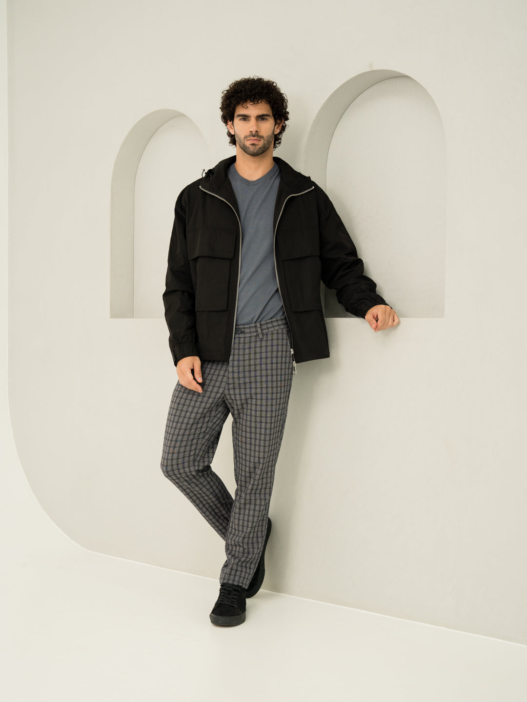 Full front view of crow black checks slim fit power stretch pant at Pant Project