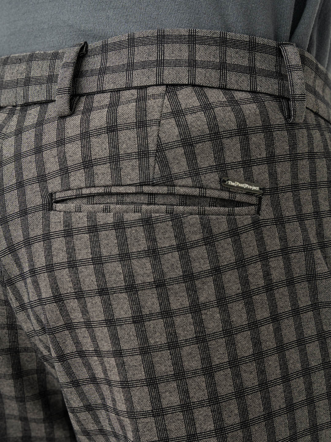 Back pocket detail of crow black checks slim fit power stretch pant at Pant Project
