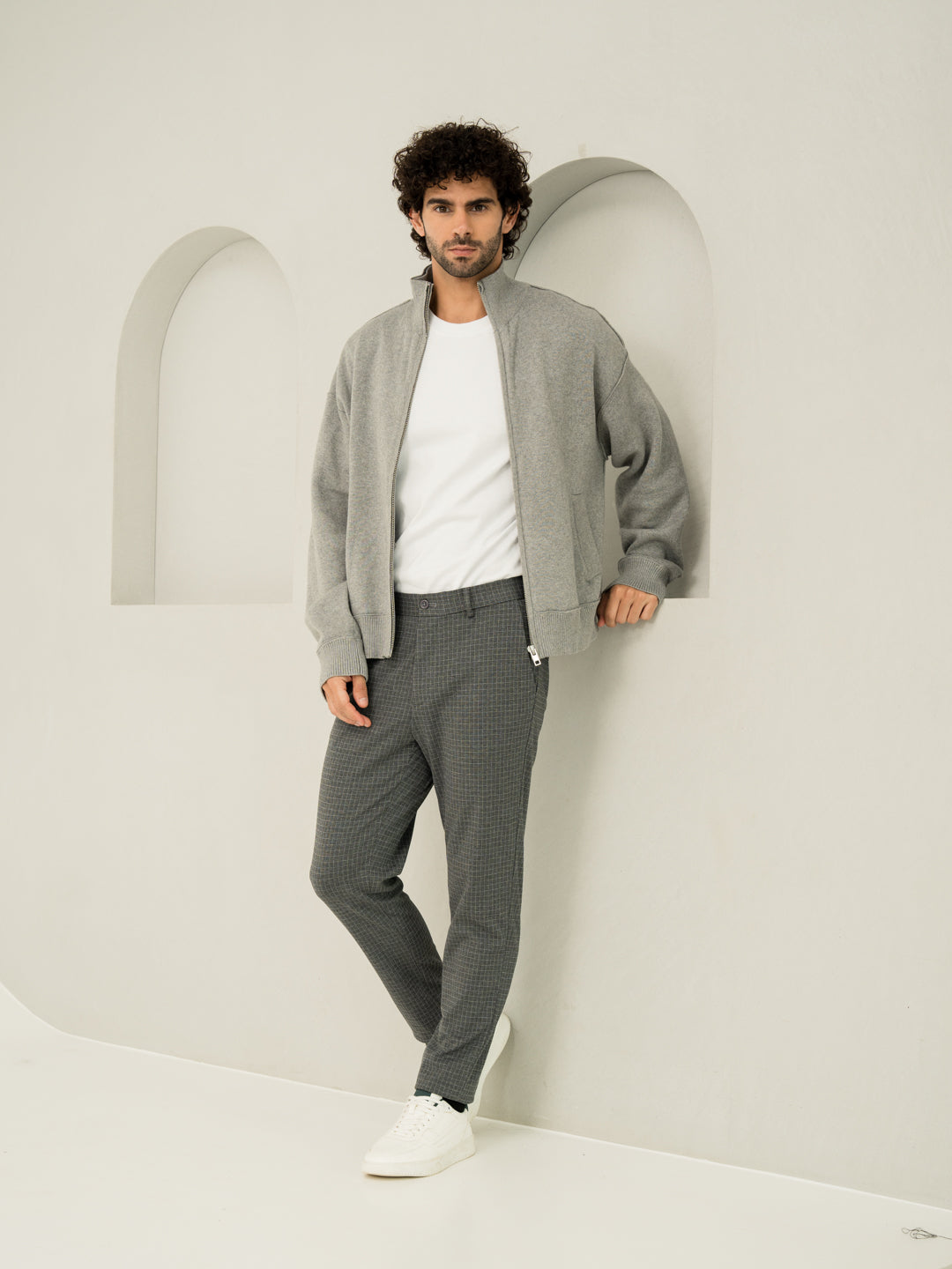 Relaxed fit of medium grey checks slim fit power stretch pant at Pant Project