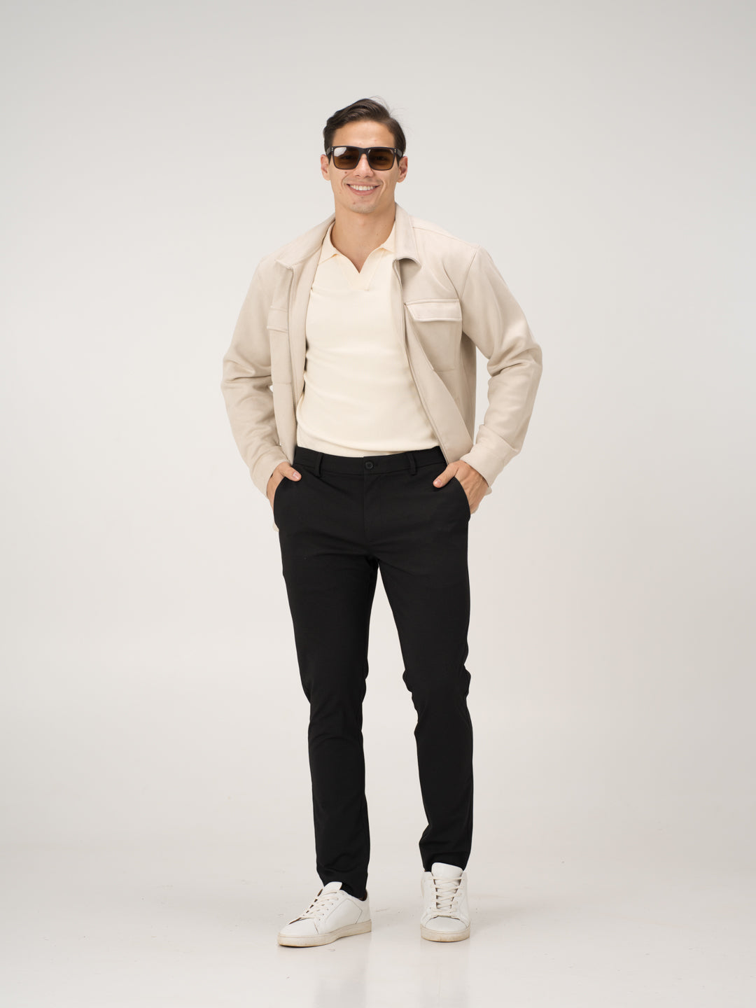 Pant Project black stretchable trousers styled with beige jacket