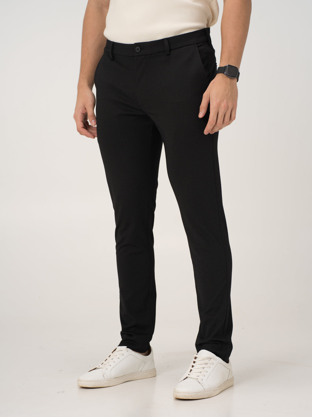 Front view of black stretchable trousers by pant project, focusing on the slim fit and tailored design