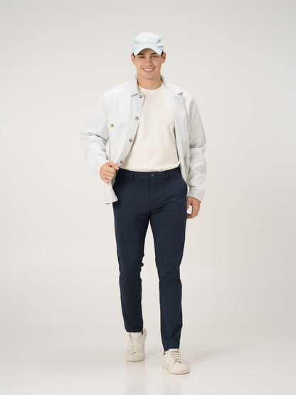 Full view of navy blue stretchable trousers by pant project, focusing on the fit and design