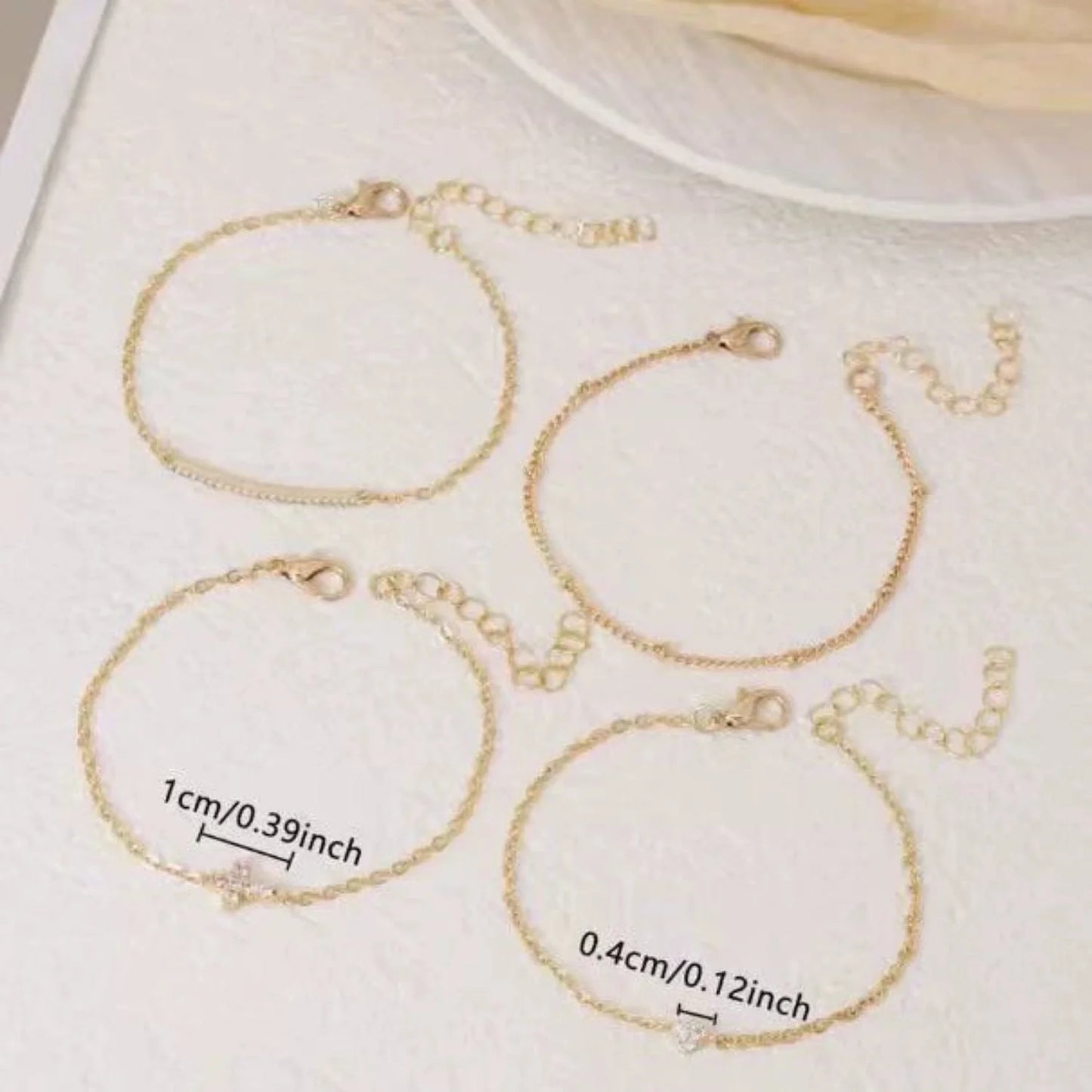 Delicate Gold Sparkling Bracelet Set JLTB1011 (Pack of 4)