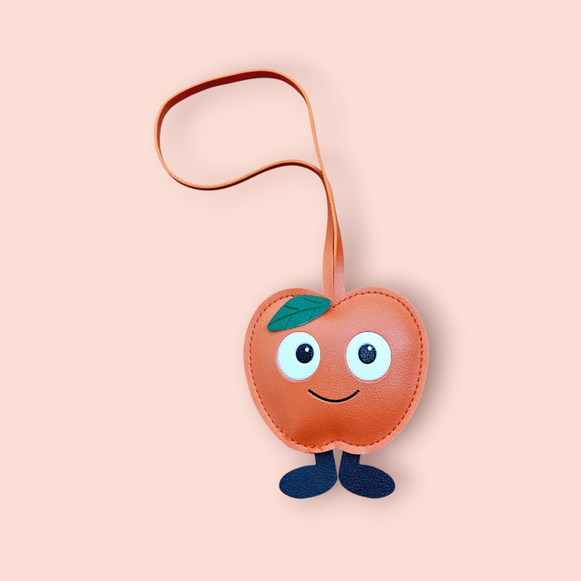 KIU Apple Bag Charm | KIU at Broadway