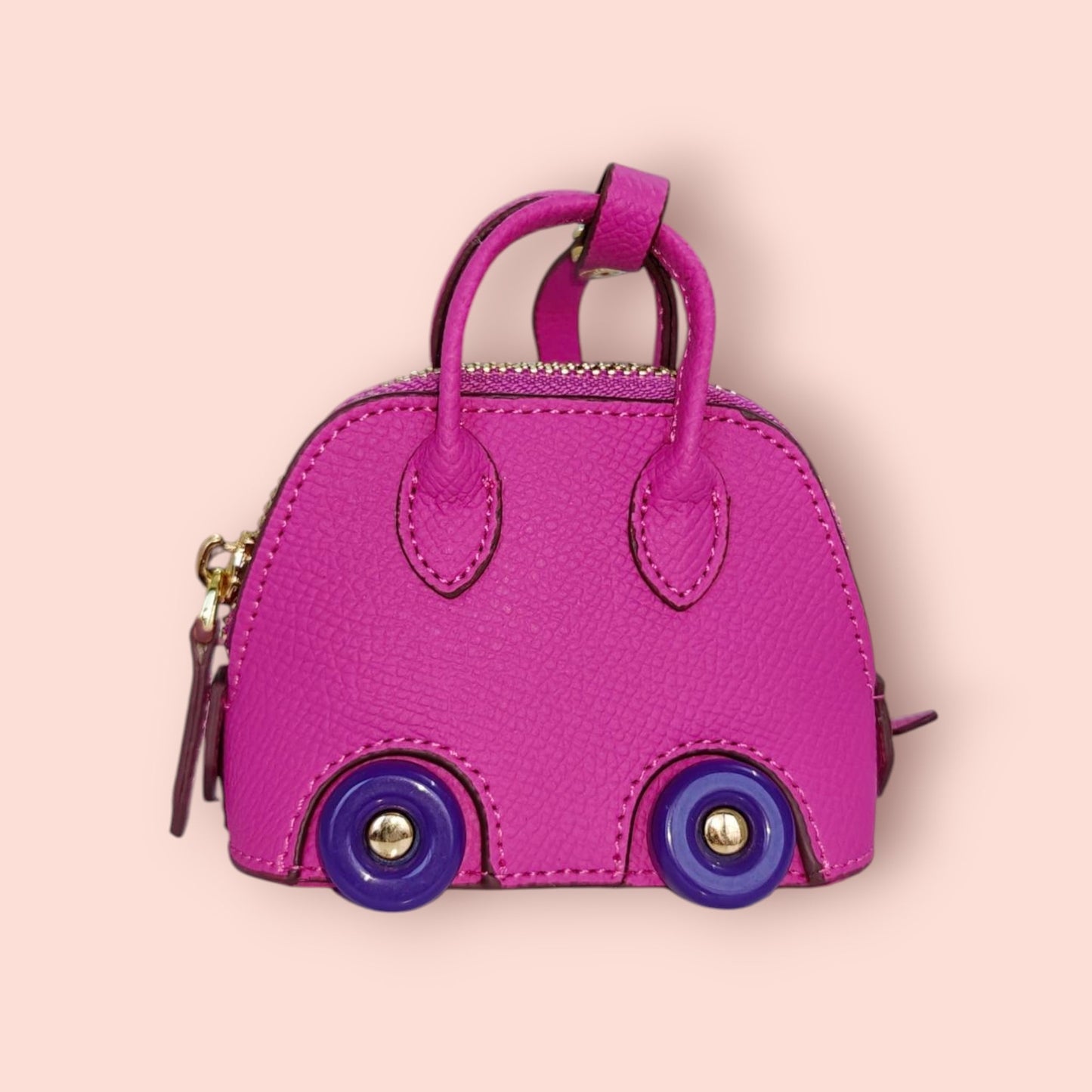 KIU Luxury Mini Wheels Bag Charm | KIU at Broadway