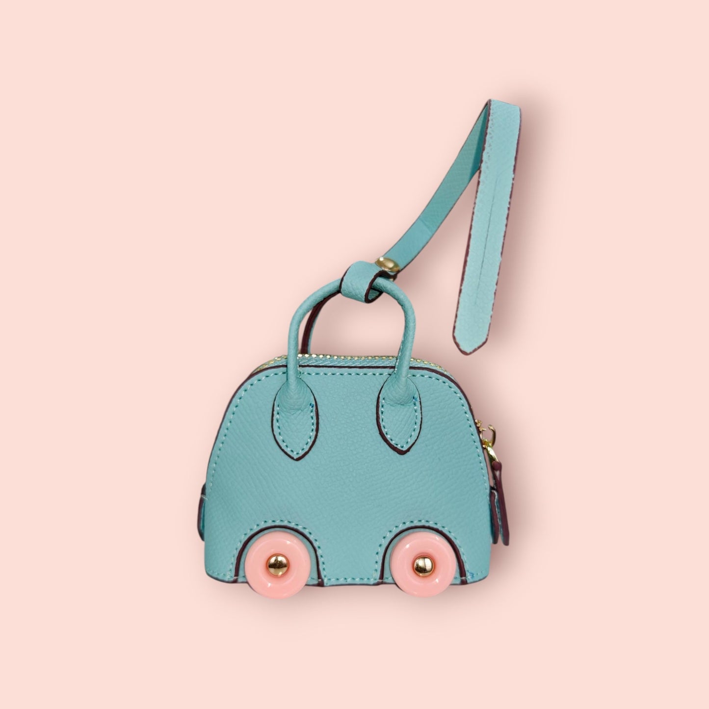 KIU Luxury Mini Wheels Bag Charm | KIU at Broadway