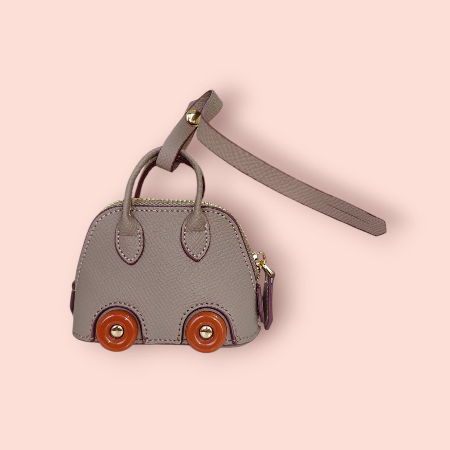 KIU Luxury Mini Wheels Bag Charm | KIU at Broadway