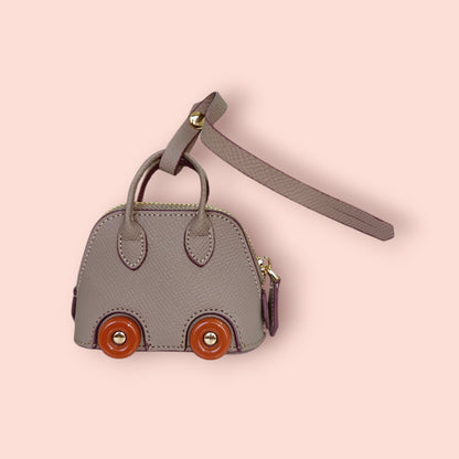 KIU Luxury Mini Wheels Bag Charm | KIU at Broadway
