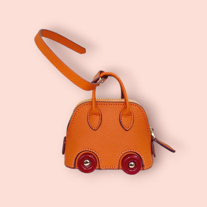 KIU Luxury Mini Wheels Bag Charm | KIU at Broadway