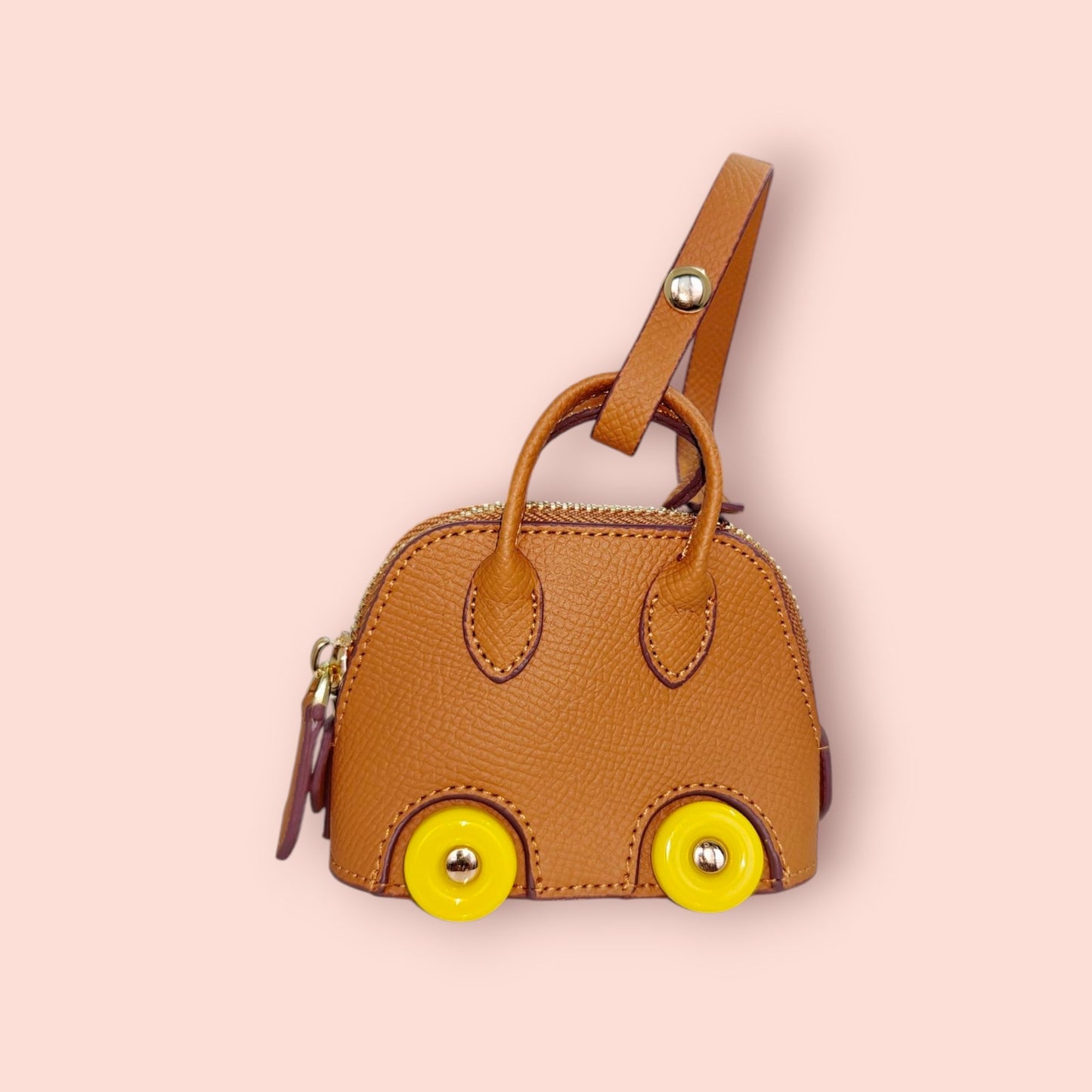 KIU Luxury Mini Wheels Bag Charm | KIU at Broadway