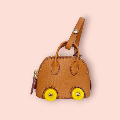 KIU Luxury Mini Wheels Bag Charm | KIU at Broadway