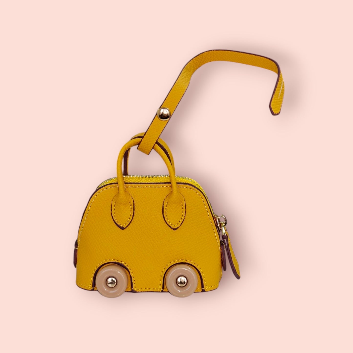 KIU Luxury Mini Wheels Bag Charm | KIU at Broadway