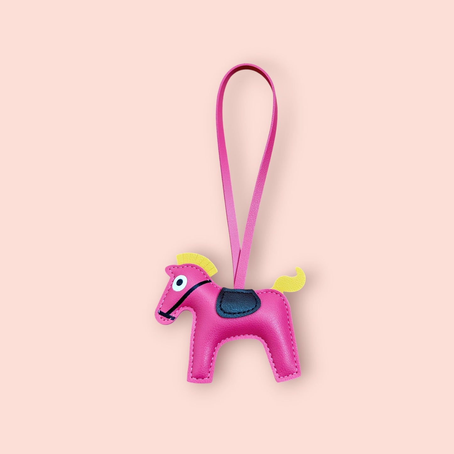 KIU Queen's Horse Bag Charm | KIU at Broadway