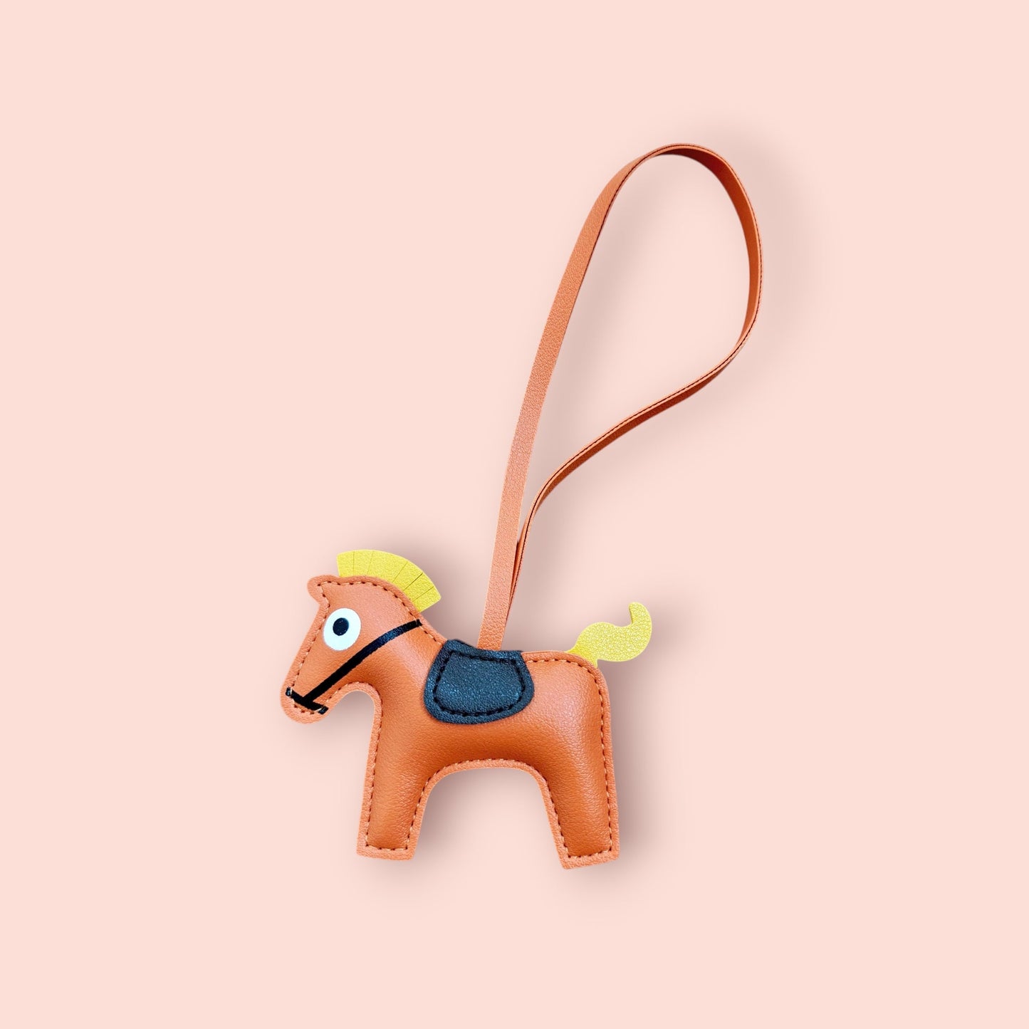 KIU Queen's Horse Bag Charm | KIU at Broadway