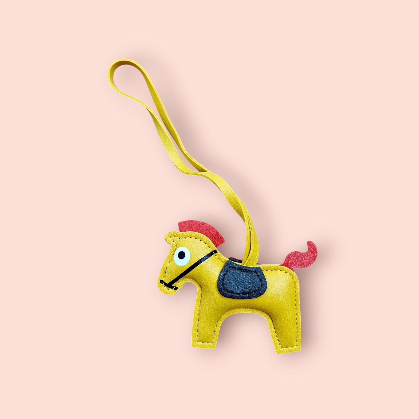 KIU Queen's Horse Bag Charm | KIU at Broadway