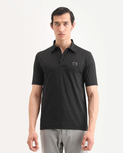 Rare Rabbit Men's Badger-S26 Black Cotton Blend Fabric Half Sleeve Spread Collar Regular Fit Plain Polo | Rare Rabbit at Broadway