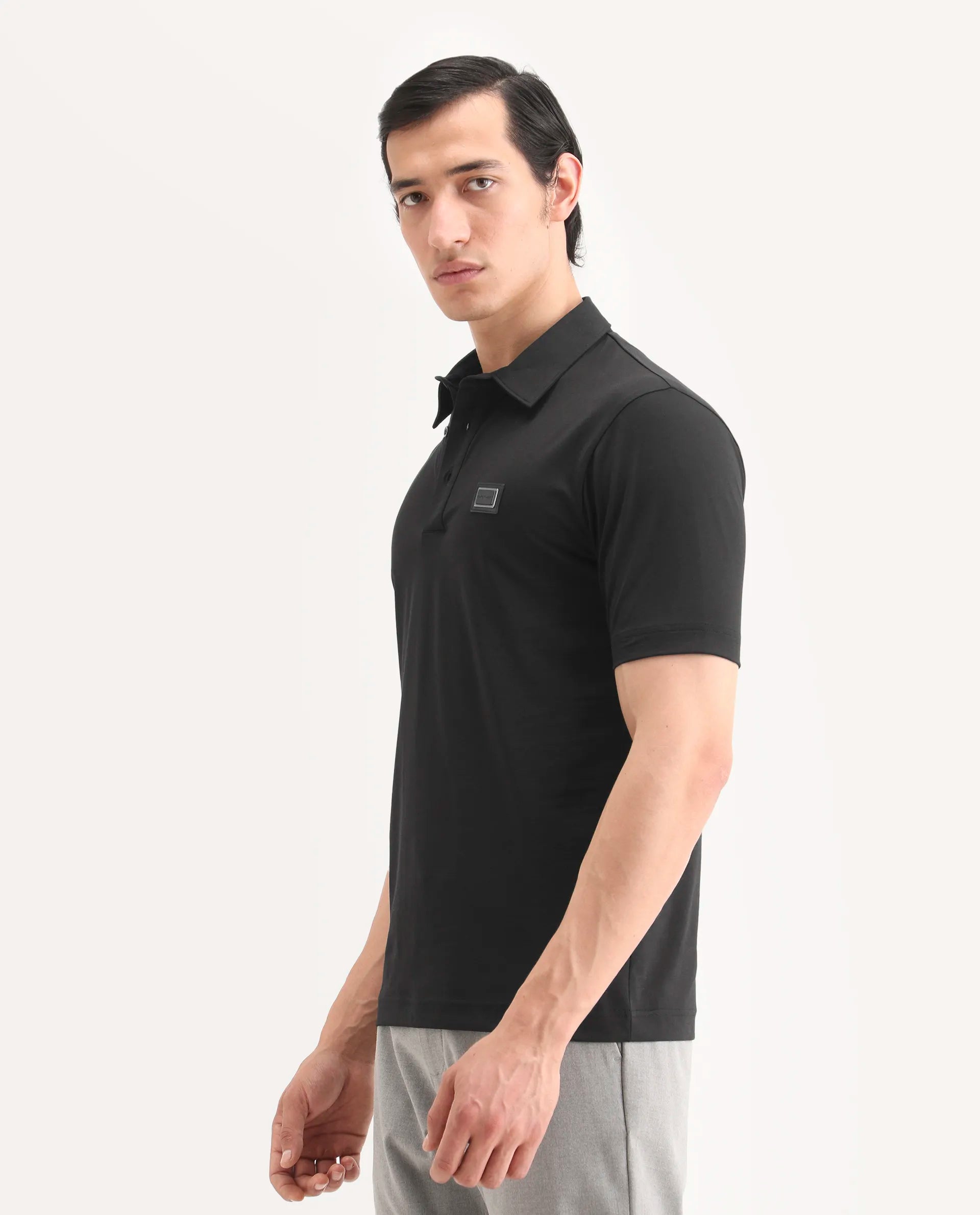 Rare Rabbit Men's Badger-S26 Black Cotton Blend Fabric Half Sleeve Spread Collar Regular Fit Plain Polo | Rare Rabbit at Broadway