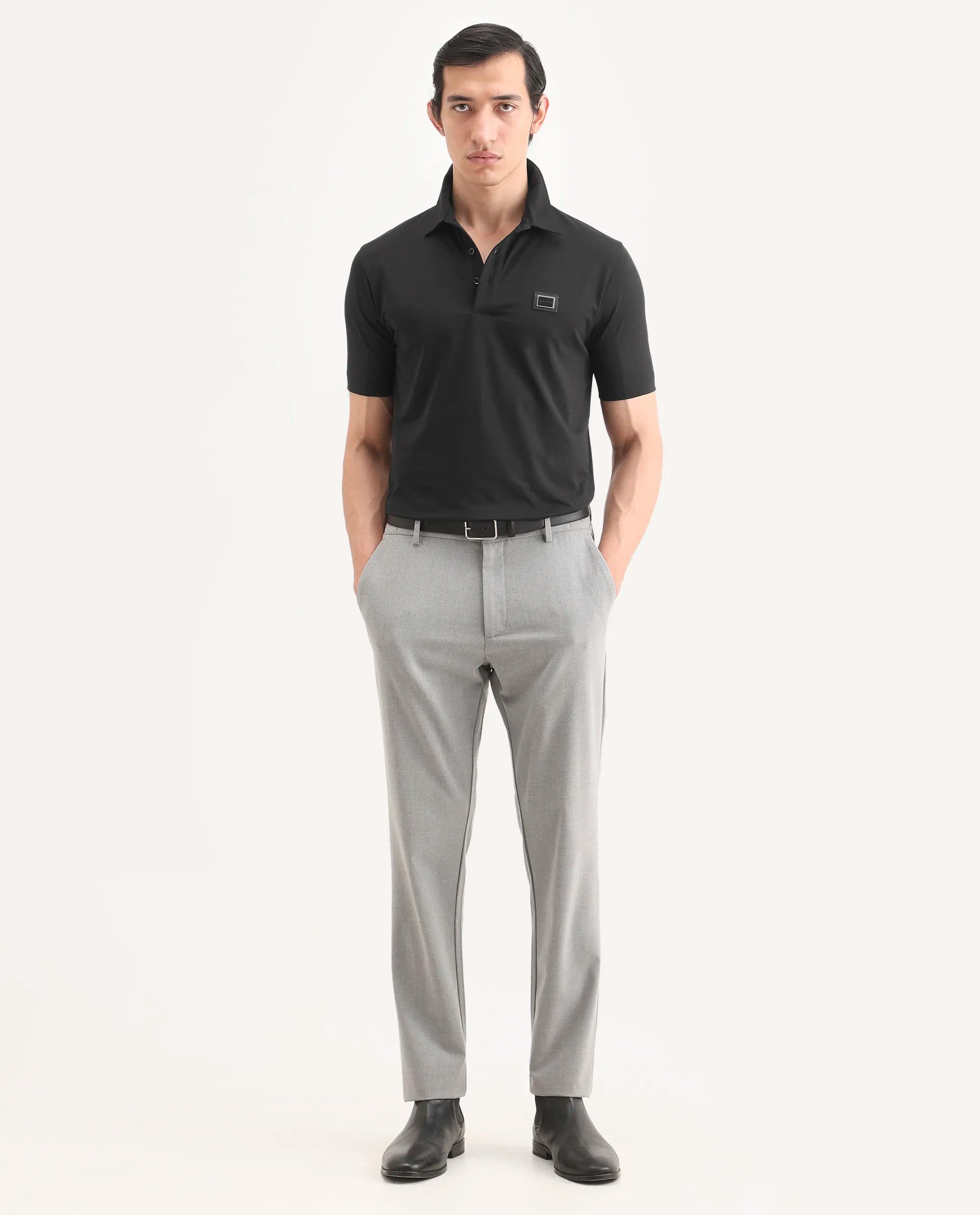 Rare Rabbit Men's Badger-S26 Black Cotton Blend Fabric Half Sleeve Spread Collar Regular Fit Plain Polo | Rare Rabbit at Broadway
