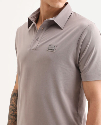 Rare Rabbit Men's Badger-S26 Dusky Purple Cotton Blend Fabric Half Sleeve Spread Collar Regular Fit Plain Polo | Rare Rabbit at Broadway