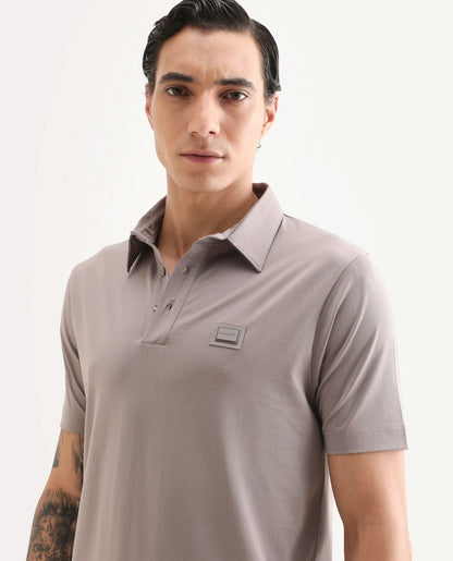Rare Rabbit Men's Badger-S26 Dusky Purple Cotton Blend Fabric Half Sleeve Spread Collar Regular Fit Plain Polo | Rare Rabbit at Broadway