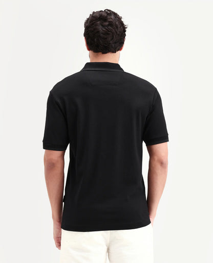 Rare Rabbit Men's Clak Black Cotton Blend Fabric Half Sleeve Spread Collar Regular Fit Plain Polo | Rare Rabbit at Broadway