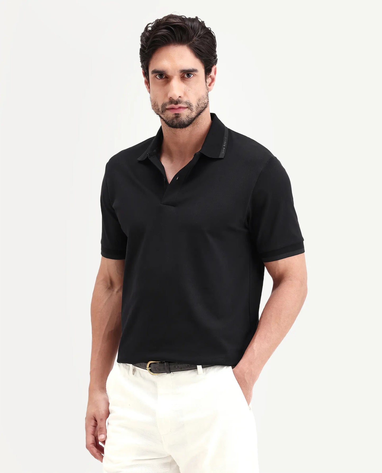 Rare Rabbit Men's Clak Black Cotton Blend Fabric Half Sleeve Spread Collar Regular Fit Plain Polo | Rare Rabbit at Broadway