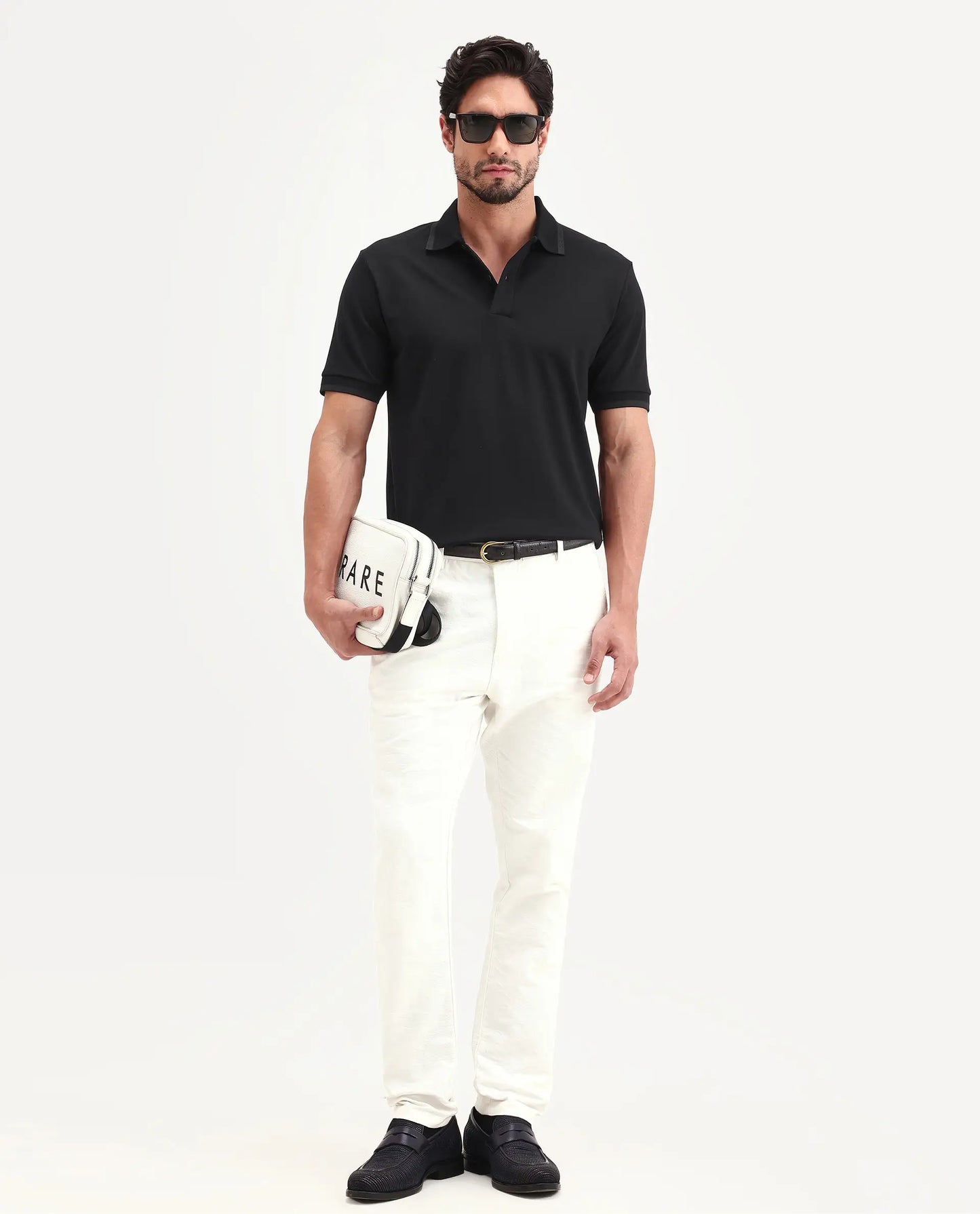 Rare Rabbit Men's Clak Black Cotton Blend Fabric Half Sleeve Spread Collar Regular Fit Plain Polo | Rare Rabbit at Broadway