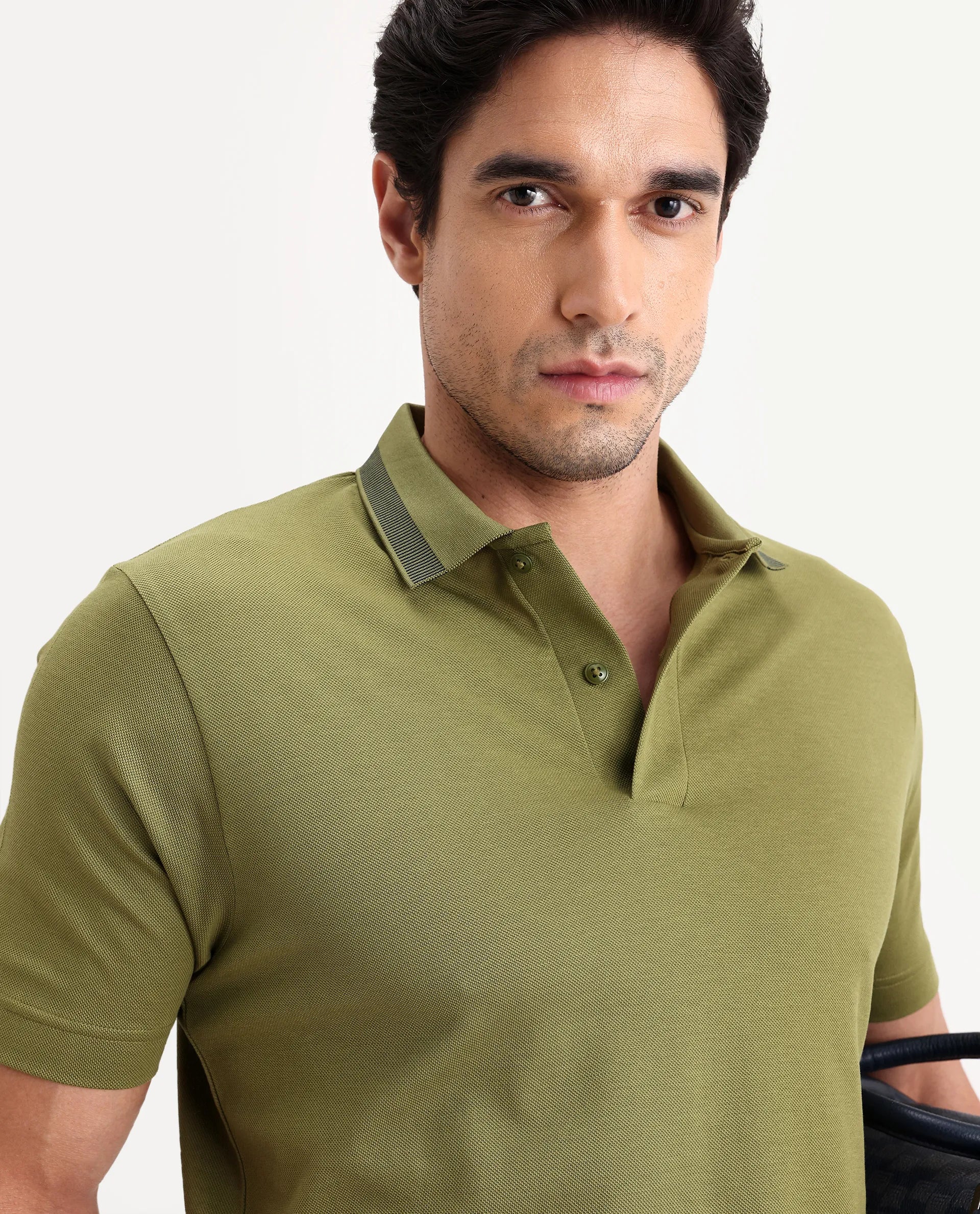 Rare Rabbit Men's Flint Olive Cotton Fabric Half Sleeve Spread Collar Regular Fit Plain Polo | Rare Rabbit at Broadway