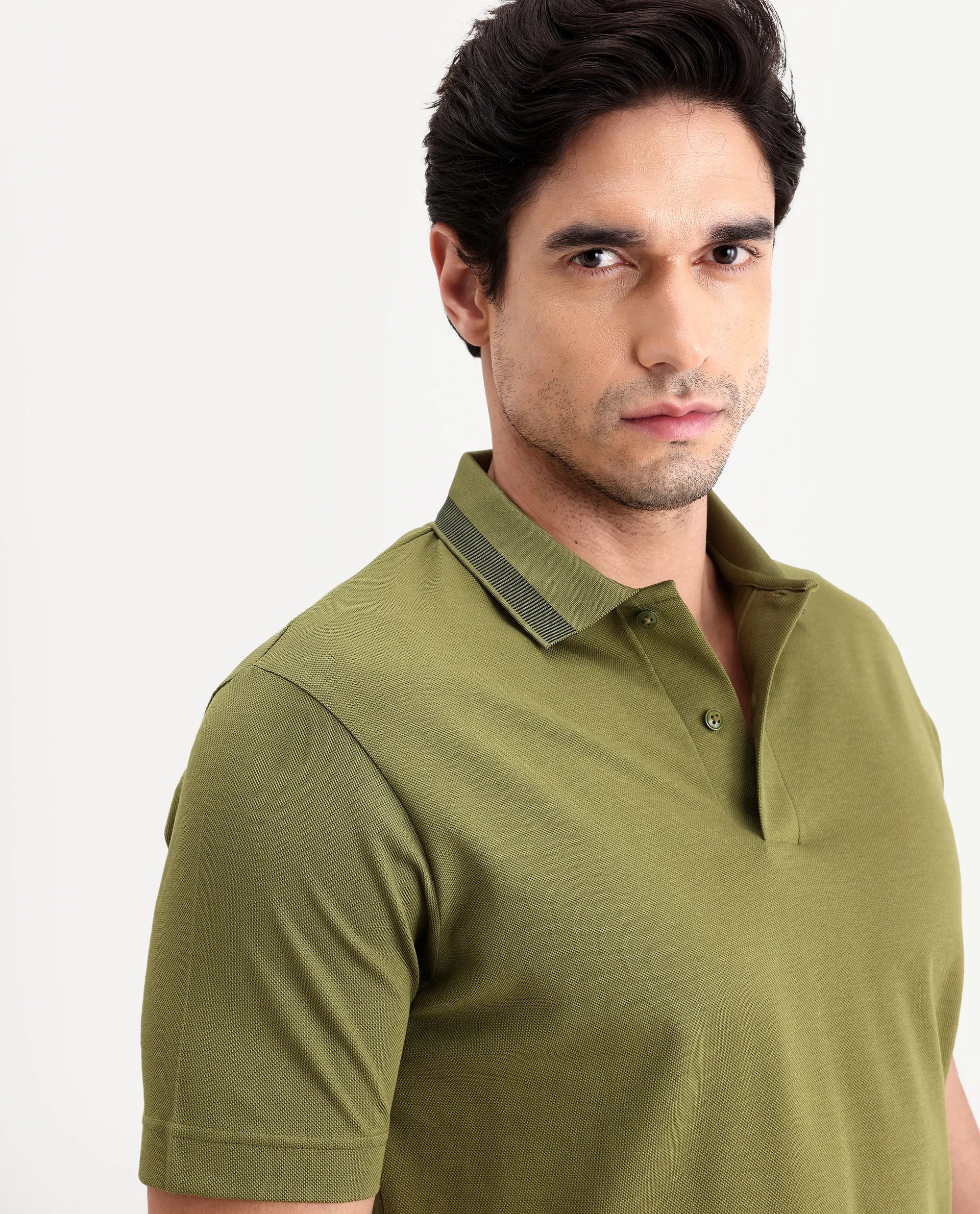 Rare Rabbit Men's Flint Olive Cotton Fabric Half Sleeve Spread Collar Regular Fit Plain Polo | Rare Rabbit at Broadway
