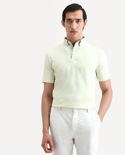 Rare Rabbit Men's Ringer-S26 Pastel Green Cotton Fabric Half Sleeve Spread Collar Regular Fit Plain Polo | Rare Rabbit at Broadway