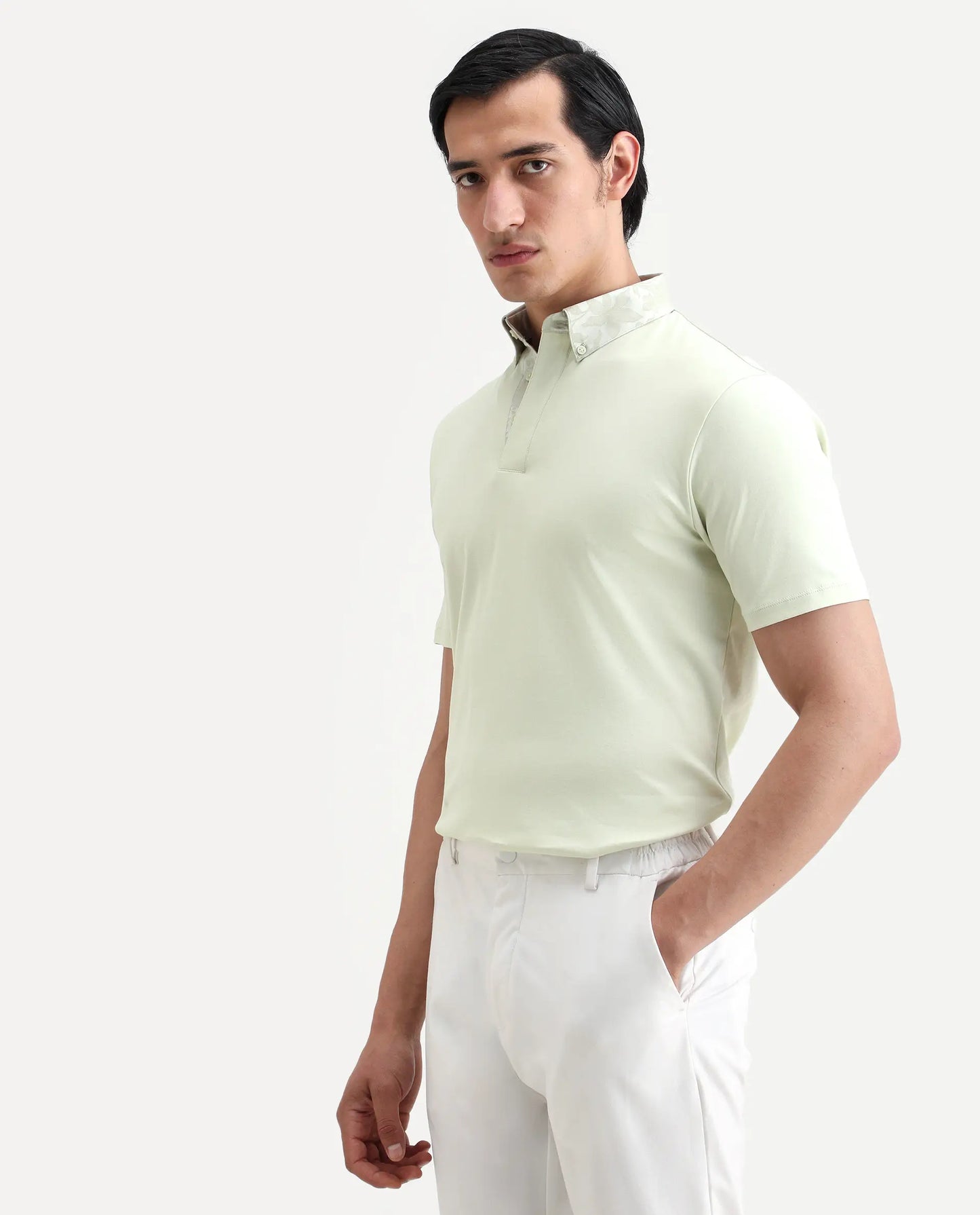 Rare Rabbit Men's Ringer-S26 Pastel Green Cotton Fabric Half Sleeve Spread Collar Regular Fit Plain Polo | Rare Rabbit at Broadway