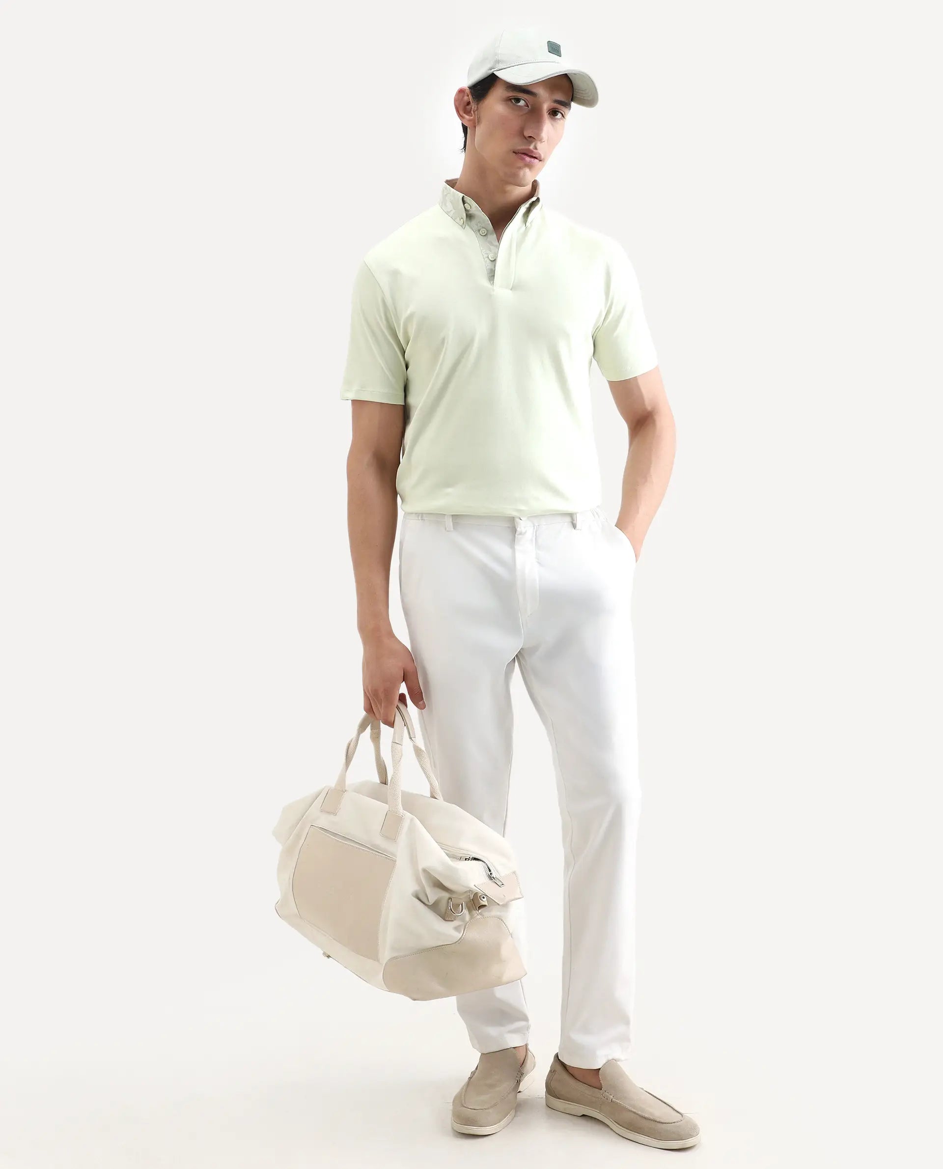 Rare Rabbit Men's Ringer-S26 Pastel Green Cotton Fabric Half Sleeve Spread Collar Regular Fit Plain Polo | Rare Rabbit at Broadway