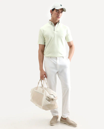 Rare Rabbit Men's Ringer-S26 Pastel Green Cotton Fabric Half Sleeve Spread Collar Regular Fit Plain Polo | Rare Rabbit at Broadway