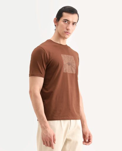 Rare Rabbit Men's Rapo Pastel Rust Cotton Blend Fabric Half Sleeve Crew Neck Regular Fit Graphic Print T-Shirt | Rare Rabbit at Broadway
