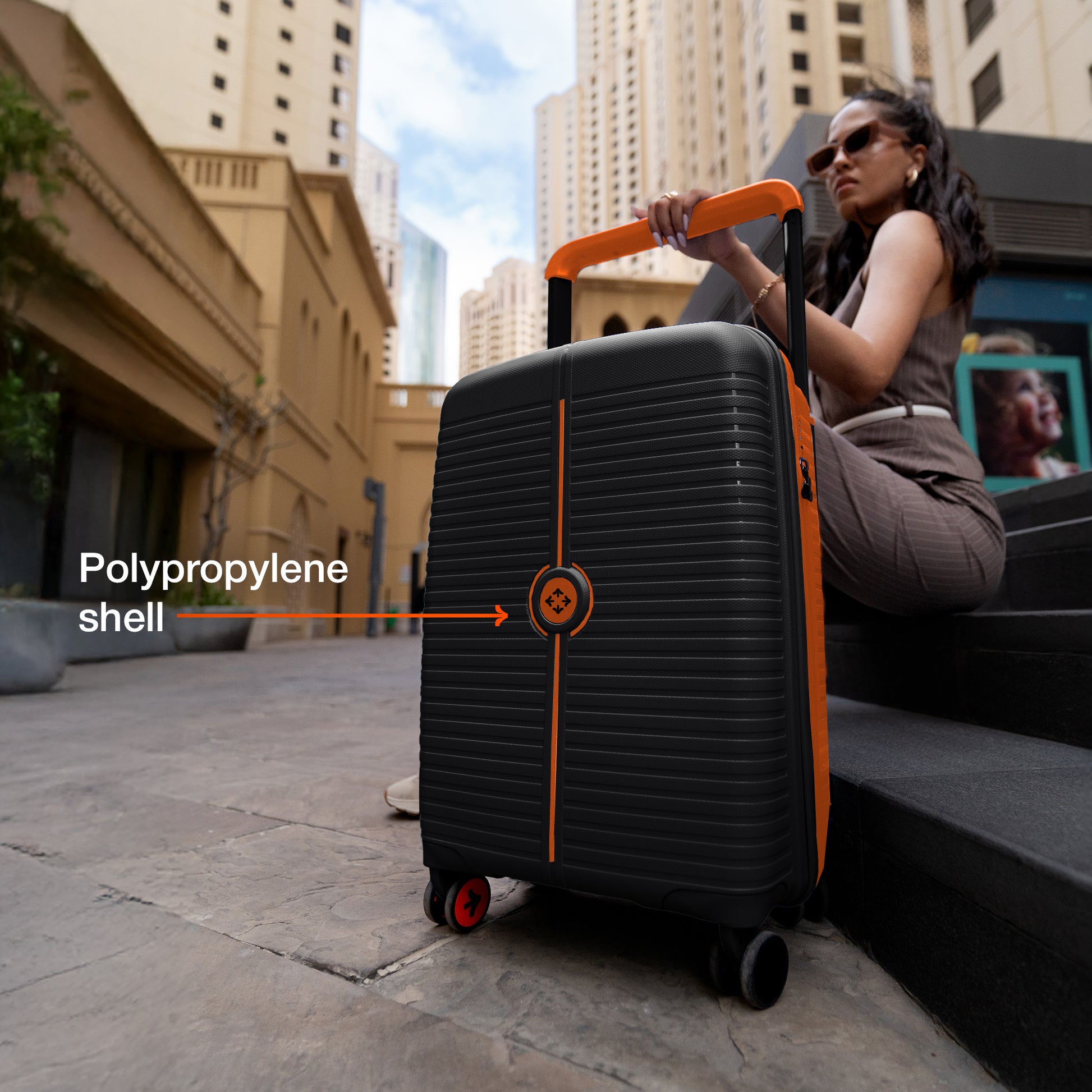 Nasher Miles Dubai TSA Lock Hard-Sided Polypropylene Cabin Luggage 20 inch | 55cm | 8 Wheels Small Trolley Bag for Travel | Suitcase (Black Orange) | Nasher Miles at Broadway