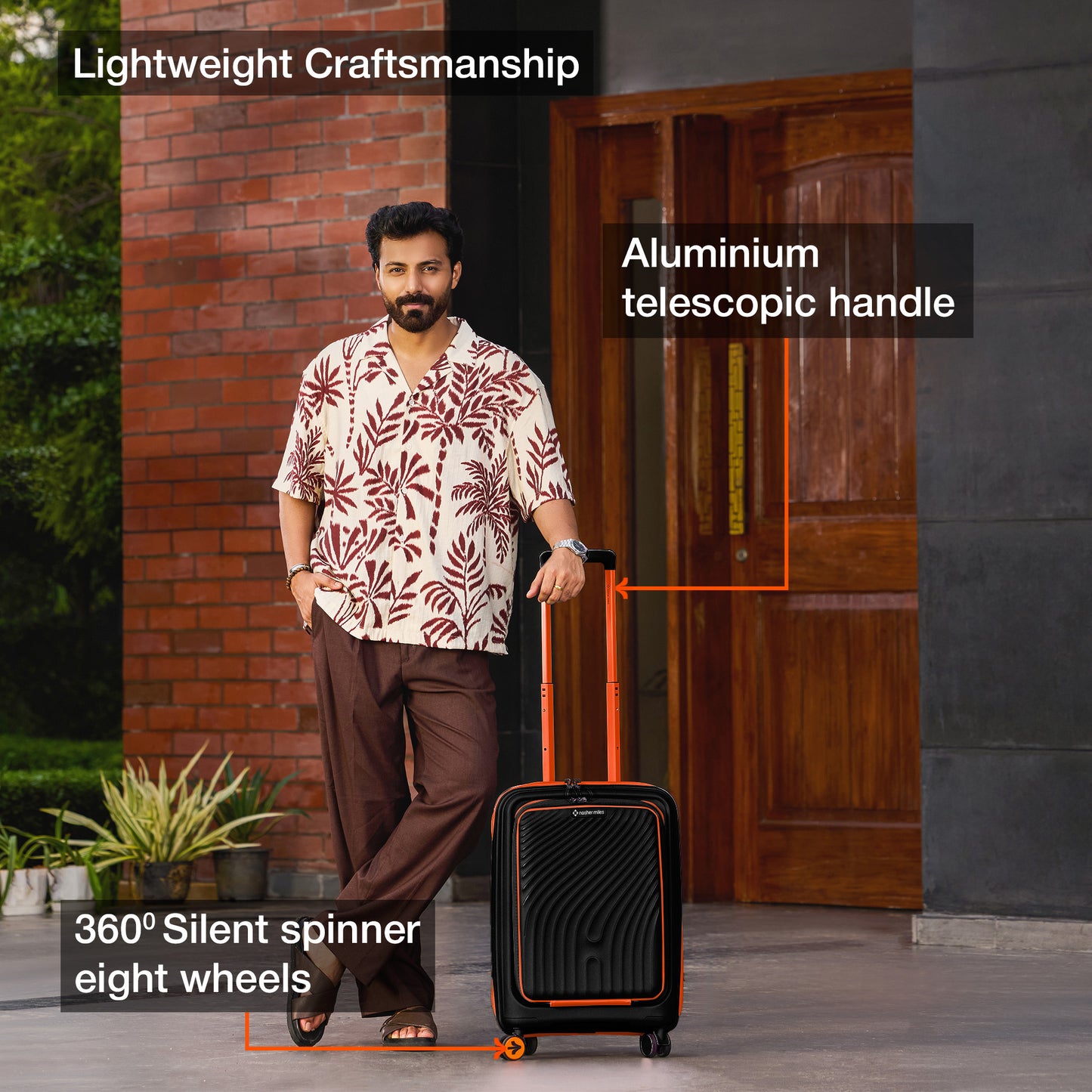 Nasher Miles Capri Hard-Sided Polypropylene Cabin Luggage with Laptop Compartment 20 inch | 55cm | 8 Wheels Small Trolley Bag for Travel | Suitcase (Black & Orange)