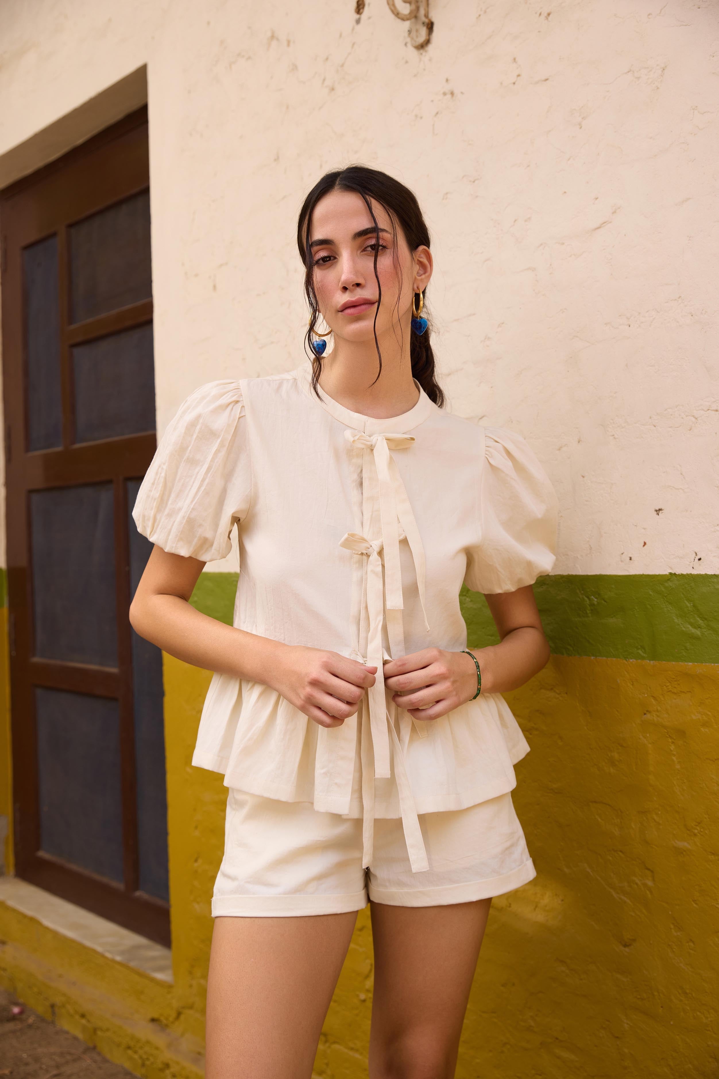 Off White Front Tie-Up Peplum Top | The Clothing Factory at Broadway