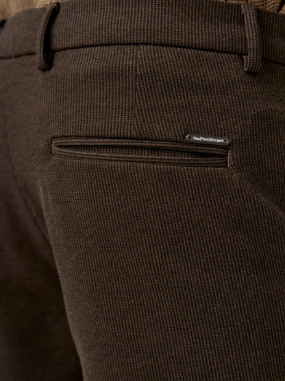 back pocket detail of the walnut brown pants with logo badge from the Pant Project