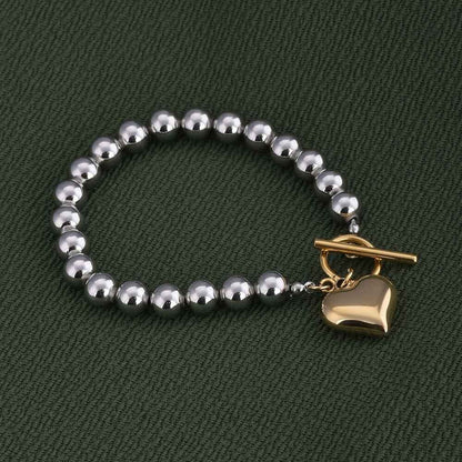 Silver Bead Bracelet with Gold Heart Charm