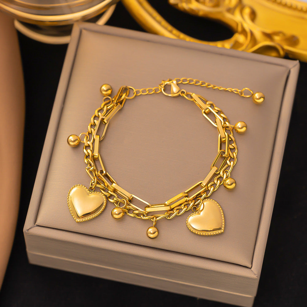 Just Lil Things Artificial Golden Heart Charm Bracelet & Link Chain Duo Elegant Layered Set    Bracelets
