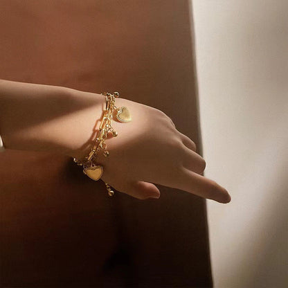 Just Lil Things Artificial Golden Heart Charm Bracelet & Link Chain Duo Elegant Layered Set    Bracelets