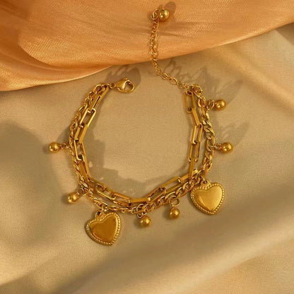 Just Lil Things Artificial Golden Heart Charm Bracelet & Link Chain Duo Elegant Layered Set    Bracelets